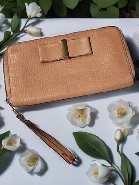 Beat Up Chloe Peach Bow Zip Wristlet Clutch